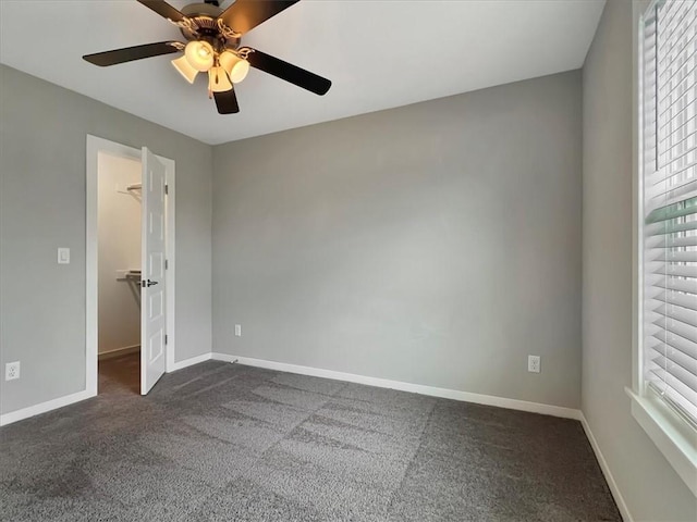 217 Idaho Ave, Farmington, AR 72730 - spare room with ceiling fan and dark carpet