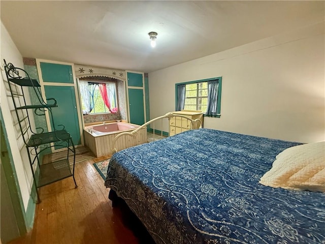 16 Nut St, Eureka Springs, AR 72632 - bedroom with hardwood / wood-style floors