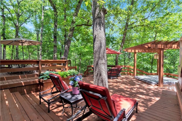 1018 N Canterbury Rd, Fayetteville, AR 72701 - deck featuring outdoor dining space and a pergola