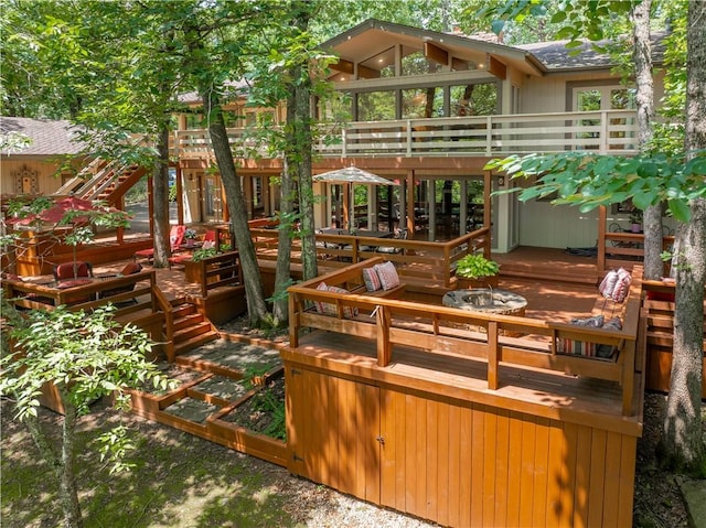 1018 N Canterbury Rd, Fayetteville, AR 72701 - rear view of house with a deck and a shingled roof