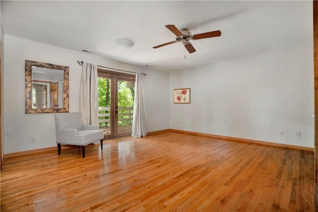 1018 N Canterbury Rd, Fayetteville, AR 72701 - living area featuring light wood-style floors and ceiling fan