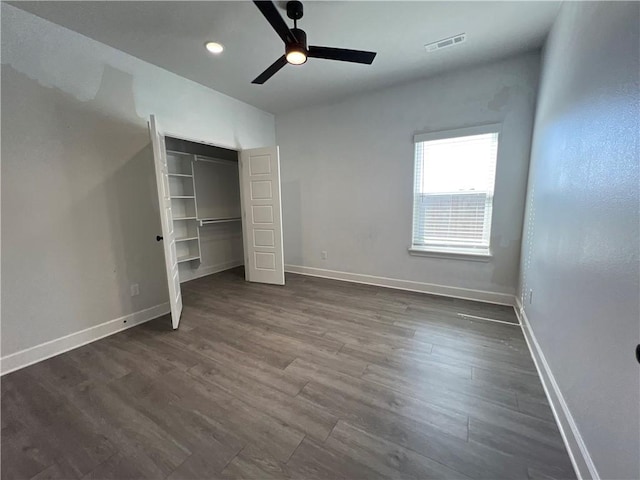1340 Mt Hood Dr, Centerton, AR 72719 - unfurnished bedroom with dark wood-style floors, a ceiling fan, a closet, and recessed lighting