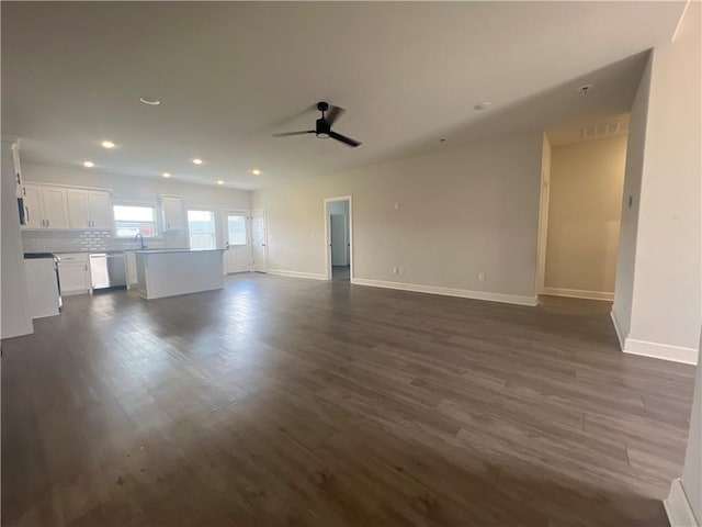 1340 Mt Hood Dr, Centerton, AR 72719 - unfurnished living room with dark wood finished floors, ceiling fan, and recessed lighting