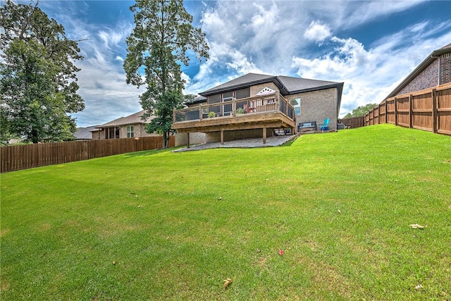 1208 Hickory St, Cave Springs, AR 72718 - rear view of property with a fenced backyard and a wooden deck