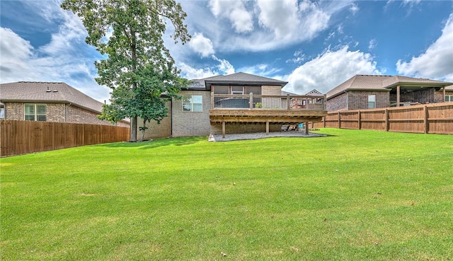 1208 Hickory St, Cave Springs, AR 72718 - rear view of property featuring a fenced backyard, a wooden deck, and brick siding