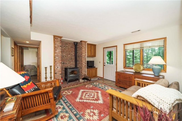 161 Hillcrest Rd, Eureka Springs, AR 72631 - living area featuring a wood stove and wood finished floors