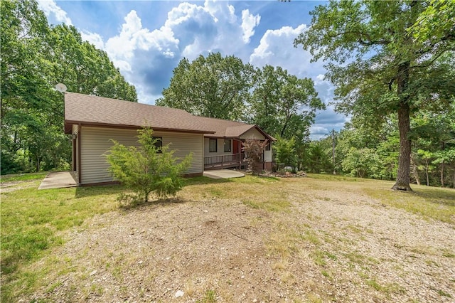 161 Hillcrest Rd, Eureka Springs, AR 72631 - rear view of property featuring a lawn