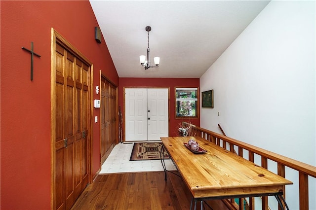 161 Hillcrest Rd, Eureka Springs, AR 72631 - foyer entrance with a chandelier and wood-type flooring