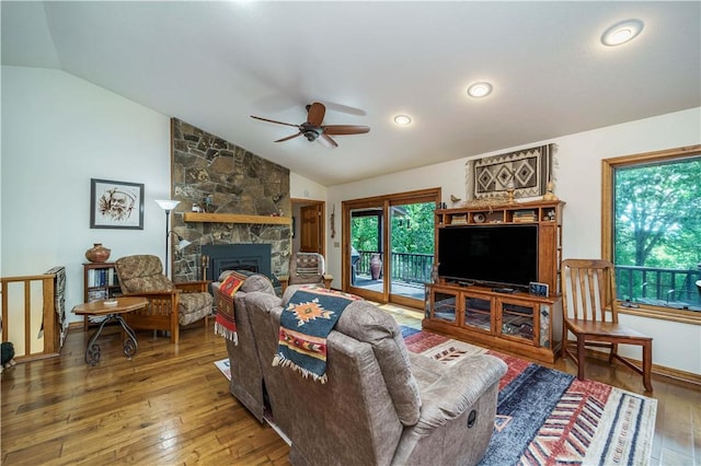 161 Hillcrest Rd, Eureka Springs, AR 72631 - living area with lofted ceiling, a ceiling fan, hardwood / wood-style floors, a stone fireplace, and recessed lighting