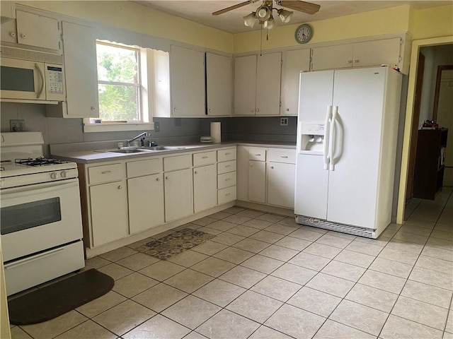 3218 Mulberry Wire Rd, Mulberry, AR 72947 - kitchen featuring white appliances, ceiling fan, light tile patterned flooring, light countertops, and cream cabinets