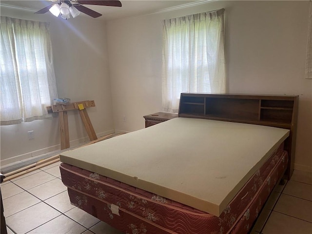 3218 Mulberry Wire Rd, Mulberry, AR 72947 - bedroom with light tile patterned flooring and ceiling fan