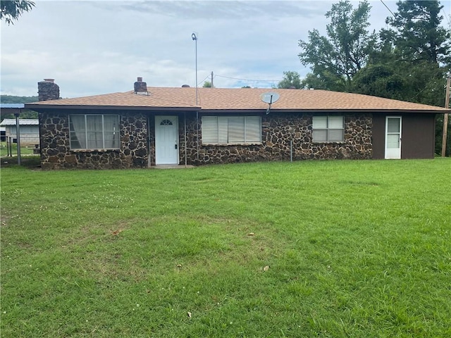 3218 Mulberry Wire Rd, Mulberry, AR 72947 - view of front of house with stone siding, a chimney, a front yard, and a shingled roof