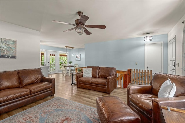16590 Roughton Ln, Pea Ridge, AR 72751 - living area featuring a ceiling fan and light wood-type flooring