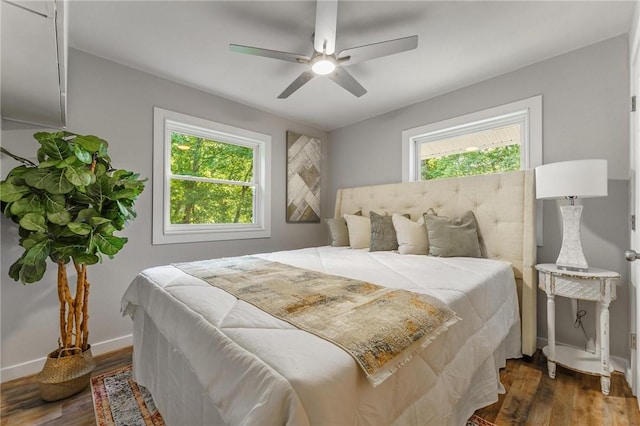 2 Rochdale Dr, Bella Vista, AR 72714 - bedroom with dark wood finished floors and ceiling fan