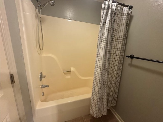 116 Autumn Cv, Searcy, AR 72143 - bathroom featuring shower / tub combo with curtain and tile patterned flooring