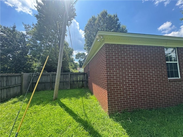 116 Autumn Cv, Searcy, AR 72143 - view of property exterior featuring a fenced backyard and brick siding