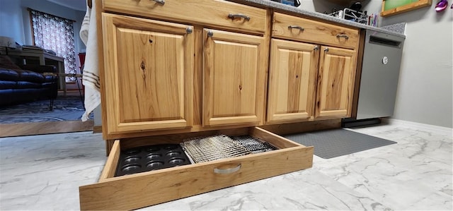 1210 Spring St, Bentonville, AR 72712 - detailed view of stainless steel dishwasher and baseboards