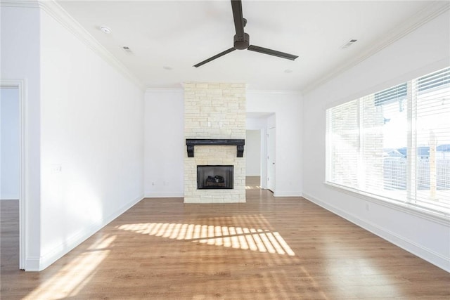 1355 NE Pershing St, Fayetteville, AR 72704 - unfurnished living room with a ceiling fan, wood finished floors, a fireplace, and ornamental molding