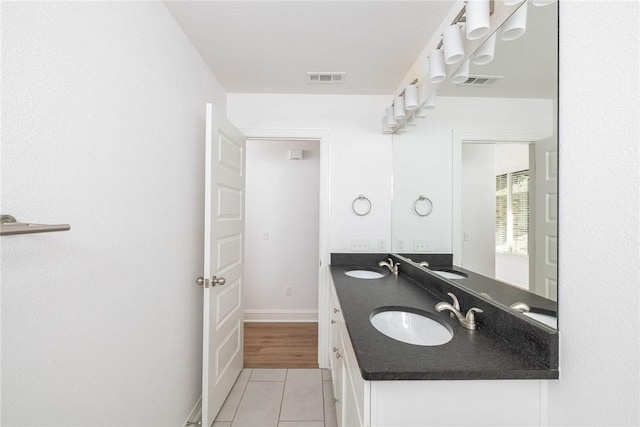 1355 NE Pershing St, Fayetteville, AR 72704 - full bath with tile patterned flooring and double vanity