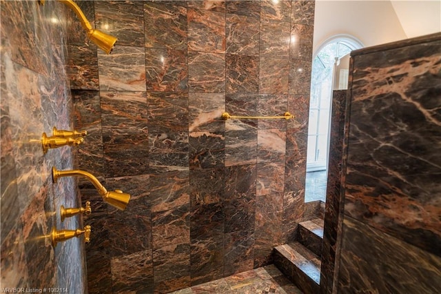 3655 Beach Way, Van Buren, AR 72956 - bathroom featuring a tile shower and marble finish floors