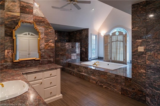 3655 Beach Way, Van Buren, AR 72956 - full bathroom with tile walls, a bath, vanity, ceiling fan, and a walk in shower