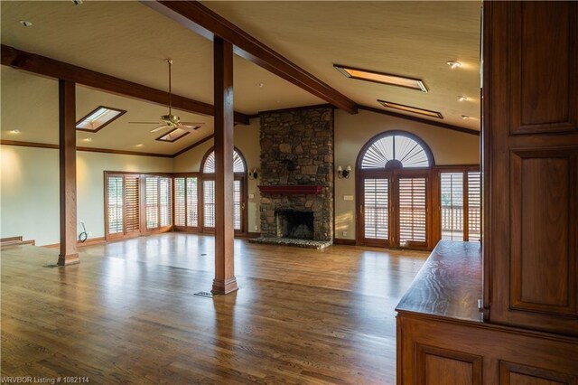 3655 Beach Way, Van Buren, AR 72956 - unfurnished living room with a ceiling fan, wood finished floors, a fireplace, and crown molding