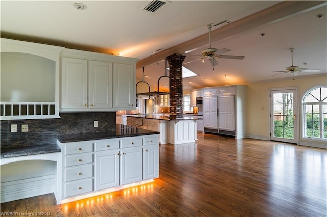 3655 Beach Way, Van Buren, AR 72956 - kitchen with ceiling fan, vaulted ceiling, backsplash, dark wood-type flooring, and white cabinets