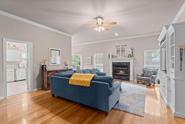 1409 S Breckenridge Loop, Rogers, AR 72756 - living room featuring a premium fireplace, ceiling fan, light wood-style flooring, and ornamental molding
