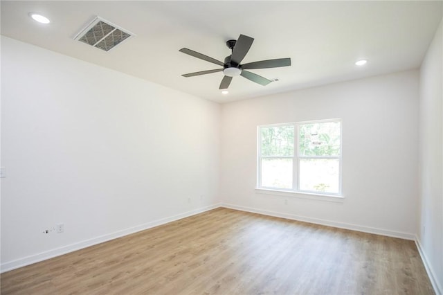 7 Consett Ln, Bella Vista, AR 72714 - empty room with wood finished floors, recessed lighting, and ceiling fan