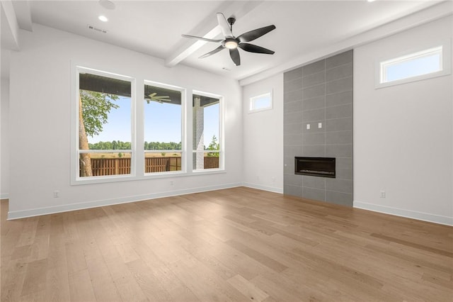 8607 W Feathered Nest Run, Bentonville, AR 72713 - unfurnished living room featuring light wood-type flooring, a ceiling fan, a fireplace, and recessed lighting
