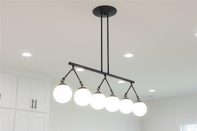 8607 W Feathered Nest Run, Bentonville, AR 72713 - detailed view of white cabinetry and recessed lighting