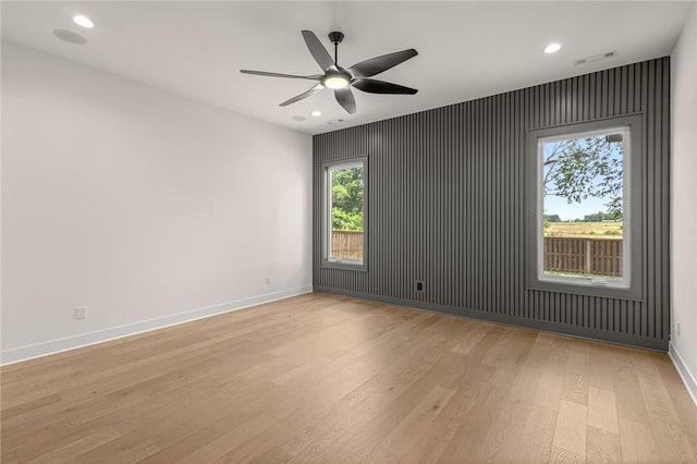 8607 W Feathered Nest Run, Bentonville, AR 72713 - spare room featuring light wood finished floors, recessed lighting, and ceiling fan