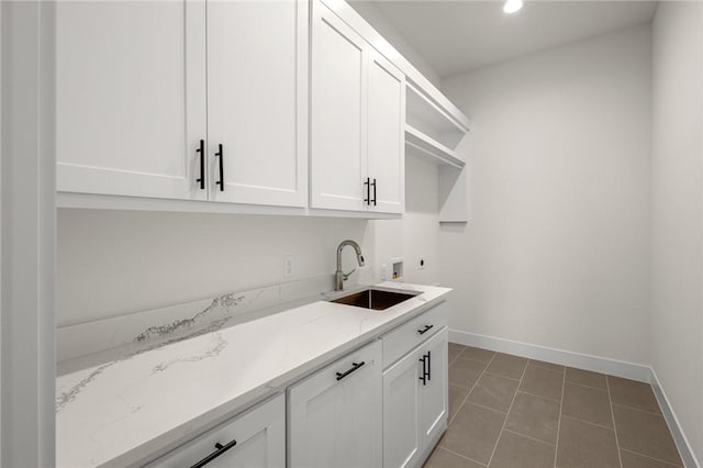 8607 W Feathered Nest Run, Bentonville, AR 72713 - washroom featuring washer hookup, hookup for an electric dryer, cabinet space, tile patterned floors, and recessed lighting