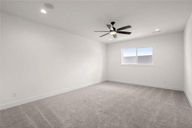 8607 W Feathered Nest Run, Bentonville, AR 72713 - spare room with a ceiling fan, recessed lighting, and light carpet
