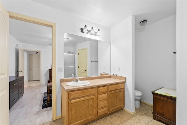 2302 12th Pl, Rogers, AR 72758 - bathroom with vanity and a shower stall