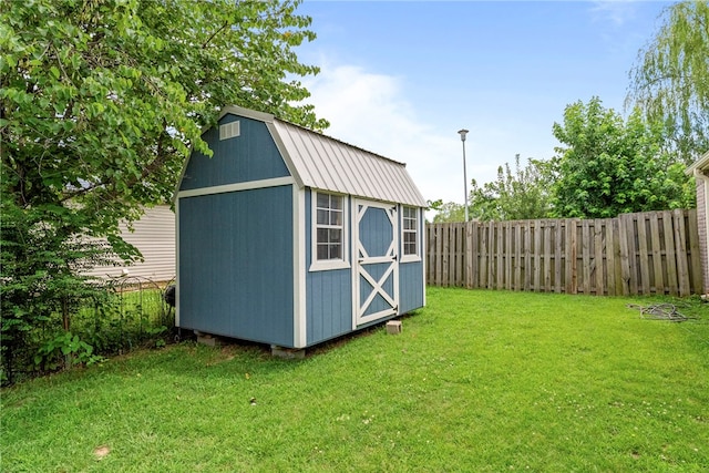 2302 12th Pl, Rogers, AR 72758 - view of shed featuring a fenced backyard