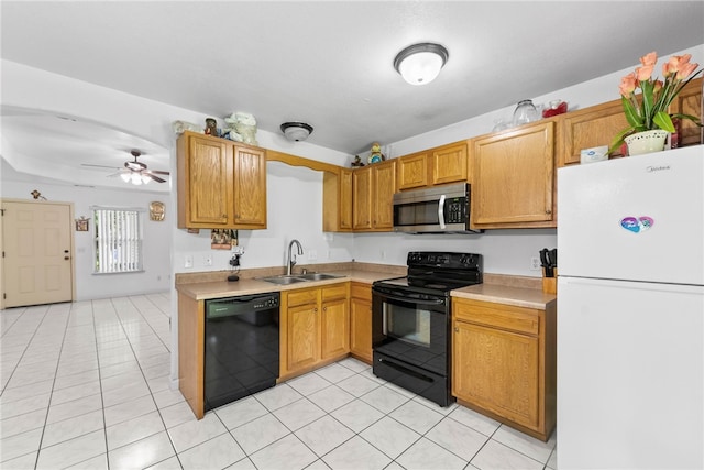 2302 12th Pl, Rogers, AR 72758 - kitchen with black appliances, light countertops, light tile patterned flooring, ceiling fan, and brown cabinetry