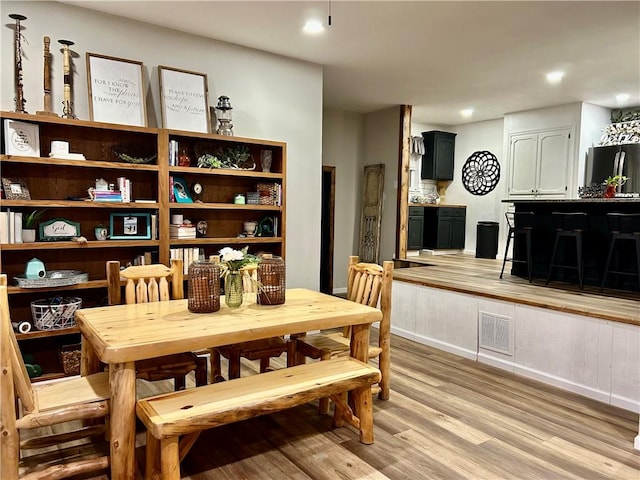 3383 Sr 164 E, Dover, AR 72837 - dining room featuring light wood-style floors and recessed lighting
