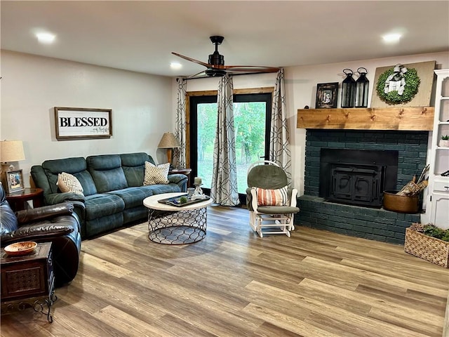 3383 Sr 164 E, Dover, AR 72837 - living area featuring ceiling fan, wood finished floors, recessed lighting, and a fireplace