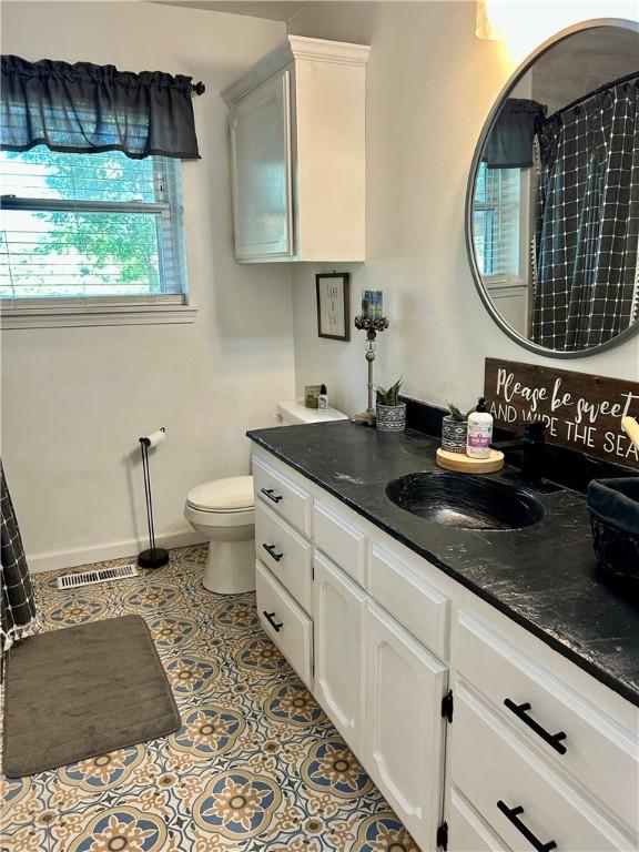 3383 Sr 164 E, Dover, AR 72837 - full bathroom with vanity and toilet