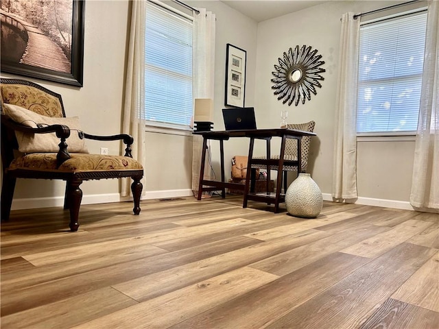 3383 Sr 164 E, Dover, AR 72837 - living area featuring wood finished floors and a desk