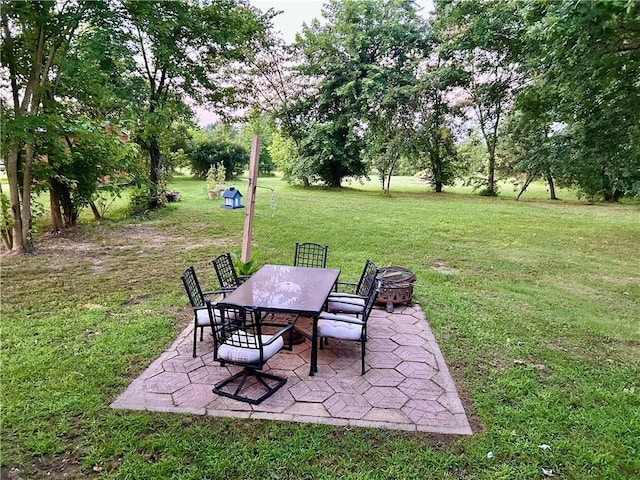 3383 Sr 164 E, Dover, AR 72837 - view of grassy yard featuring a patio area