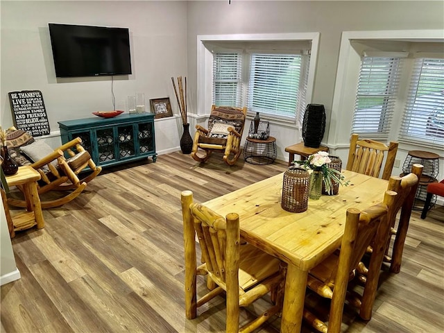 3383 Sr 164 E, Dover, AR 72837 - dining room featuring light wood-style flooring