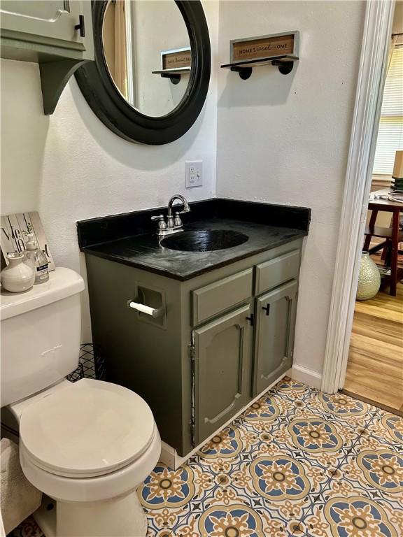 3383 Sr 164 E, Dover, AR 72837 - bathroom featuring vanity and toilet