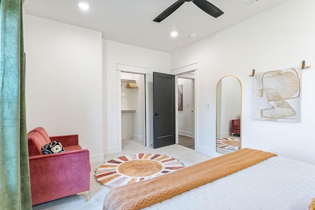 103 NW Ozark Way, Bentonville, AR 72712 - bedroom featuring arched walkways, a ceiling fan, recessed lighting, carpet, and a closet