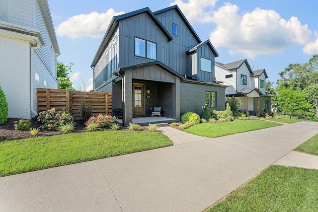 103 NW Ozark Way, Bentonville, AR 72712 - view of front facade featuring board and batten siding and brick siding