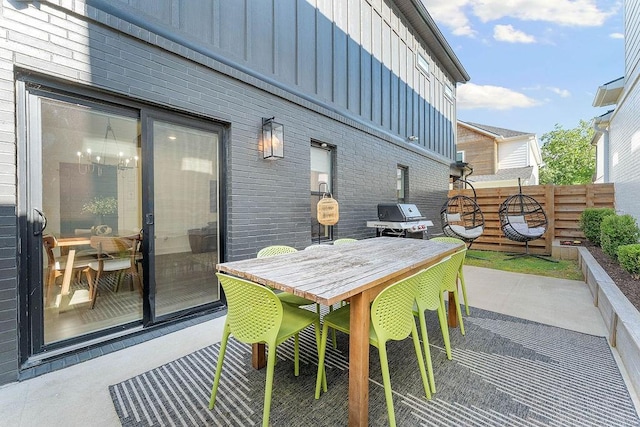 103 NW Ozark Way, Bentonville, AR 72712 - view of patio featuring area for grilling and outdoor dining area