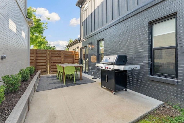 103 NW Ozark Way, Bentonville, AR 72712 - view of patio / terrace featuring outdoor dining area and grilling area