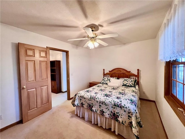 31 Table Rock Dr, Holiday Island, AR 72631 - bedroom featuring light colored carpet and ceiling fan