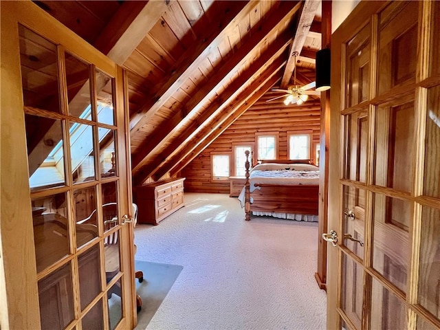 31 Table Rock Dr, Holiday Island, AR 72631 - unfurnished bedroom with french doors, wood ceiling, and carpet